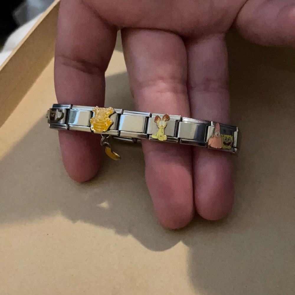 Charm bracelet with characters and candy.